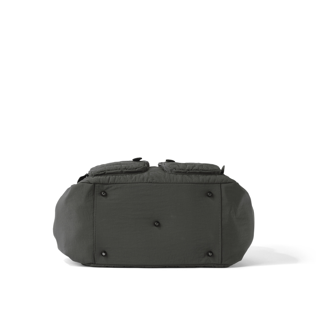 Gray duffel bag with black zippers on a white background